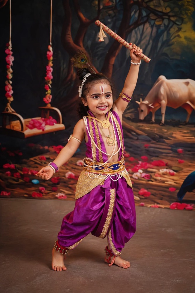 A young learner celebrating Krishna bhakti